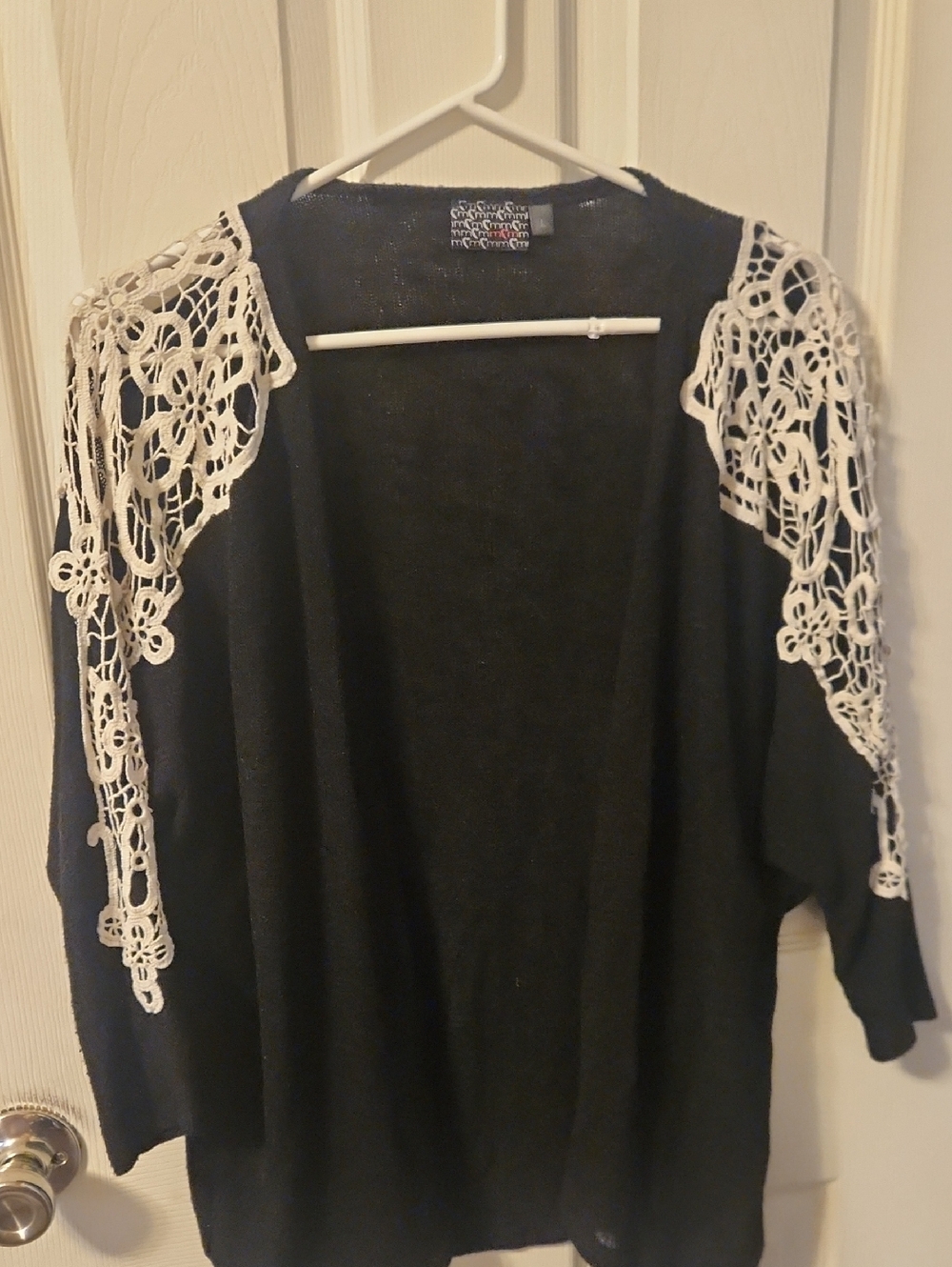 M&M'S Black Open-Front Sweater with White Crochet Shoulder Detail